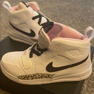 Brand new! White, pink and black Jordan Legacy 312